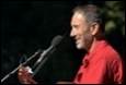 A person in a red shirt

Description automatically generated with medium confidence