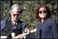 A person and person playing guitar

Description automatically generated with medium confidence