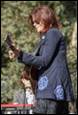 A person playing a guitar

Description automatically generated with medium confidence