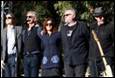 A group of people standing together

Description automatically generated with medium confidence