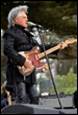 A person playing a guitar

Description automatically generated with medium confidence