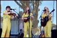 A group of women playing instruments

Description automatically generated with medium confidence