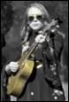 A person playing a guitar

Description automatically generated with medium confidence