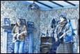 A group of people playing instruments

Description automatically generated