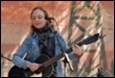 A person playing a guitar

Description automatically generated
