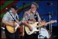 A group of men playing guitars

Description automatically generated with low confidence