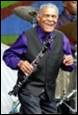 A picture containing person, music, musical instrument, clarinet

Description automatically generated