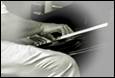 A close-up of a person playing a piano

Description automatically generated