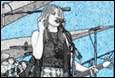 A person singing into a microphone

Description automatically generated with medium confidence