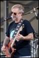 A person playing a guitar

Description automatically generated with medium confidence
