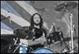 A person playing a drum set

Description automatically generated with medium confidence