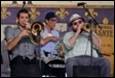 A group of people playing instruments

Description automatically generated with medium confidence