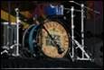A drum set on a stage

Description automatically generated