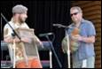 A group of men playing instruments

Description automatically generated with low confidence