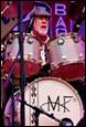 A person playing a drum set

Description automatically generated with medium confidence