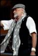 A person wearing a hat and a scarf

Description automatically generated with low confidence