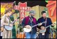 A group of people playing instruments

Description automatically generated with medium confidence