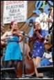 A group of women playing instruments

Description automatically generated