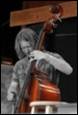 A person playing a cello

Description automatically generated