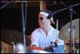 A person playing a drum set

Description automatically generated