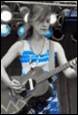 A person playing a guitar

Description automatically generated