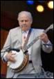 A person playing a banjo

Description automatically generated