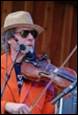 A person playing a violin

Description automatically generated