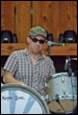 A person wearing sunglasses and a hat

Description automatically generated