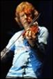 A person playing a violin

Description automatically generated