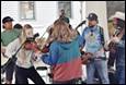 A group of people playing instruments

Description automatically generated