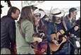 A group of people playing instruments

Description automatically generated