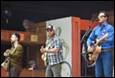 A group of people playing instruments

Description automatically generated