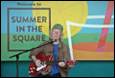 A person holding a guitar

Description automatically generated with medium confidence
