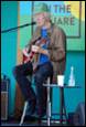 A person playing a guitar

Description automatically generated with medium confidence