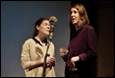 A person talking to another person

Description automatically generated with low confidence