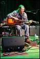 A person playing a guitar

Description automatically generated with medium confidence