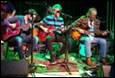 A group of people playing guitars

Description automatically generated with medium confidence