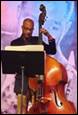 A person playing a cello

Description automatically generated with medium confidence