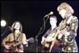 A group of people playing instruments

Description automatically generated with medium confidence