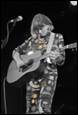A picture containing concert, musical instrument, musician, performance

Description automatically generated