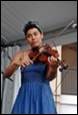 A person playing a violin

Description automatically generated with medium confidence