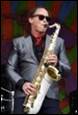 A person playing a saxophone

Description automatically generated with medium confidence